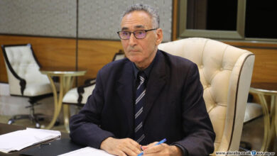 وزير الاقتصاد والتجارة محمد الحويج